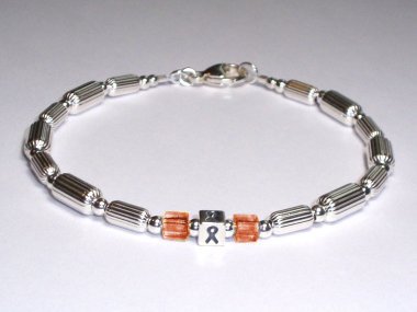 Uterine Cancer Awareness Bracelet (Unisex) - Sterling Silver & Peach Accent Cubes